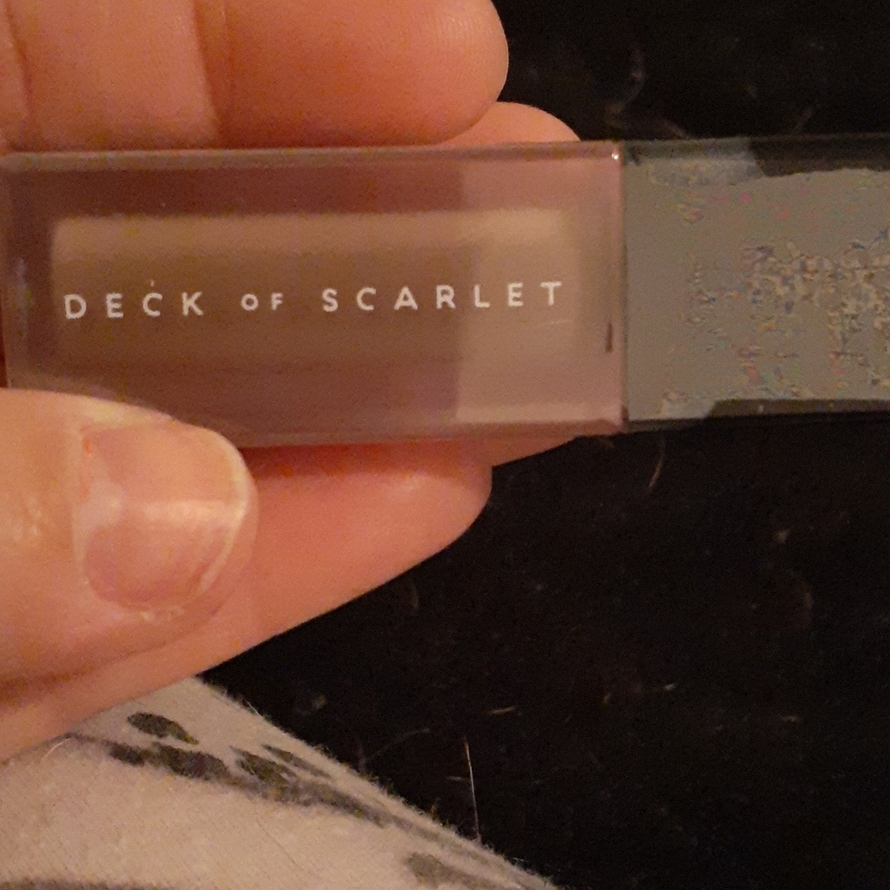 deck of scarlet power pout lip slip